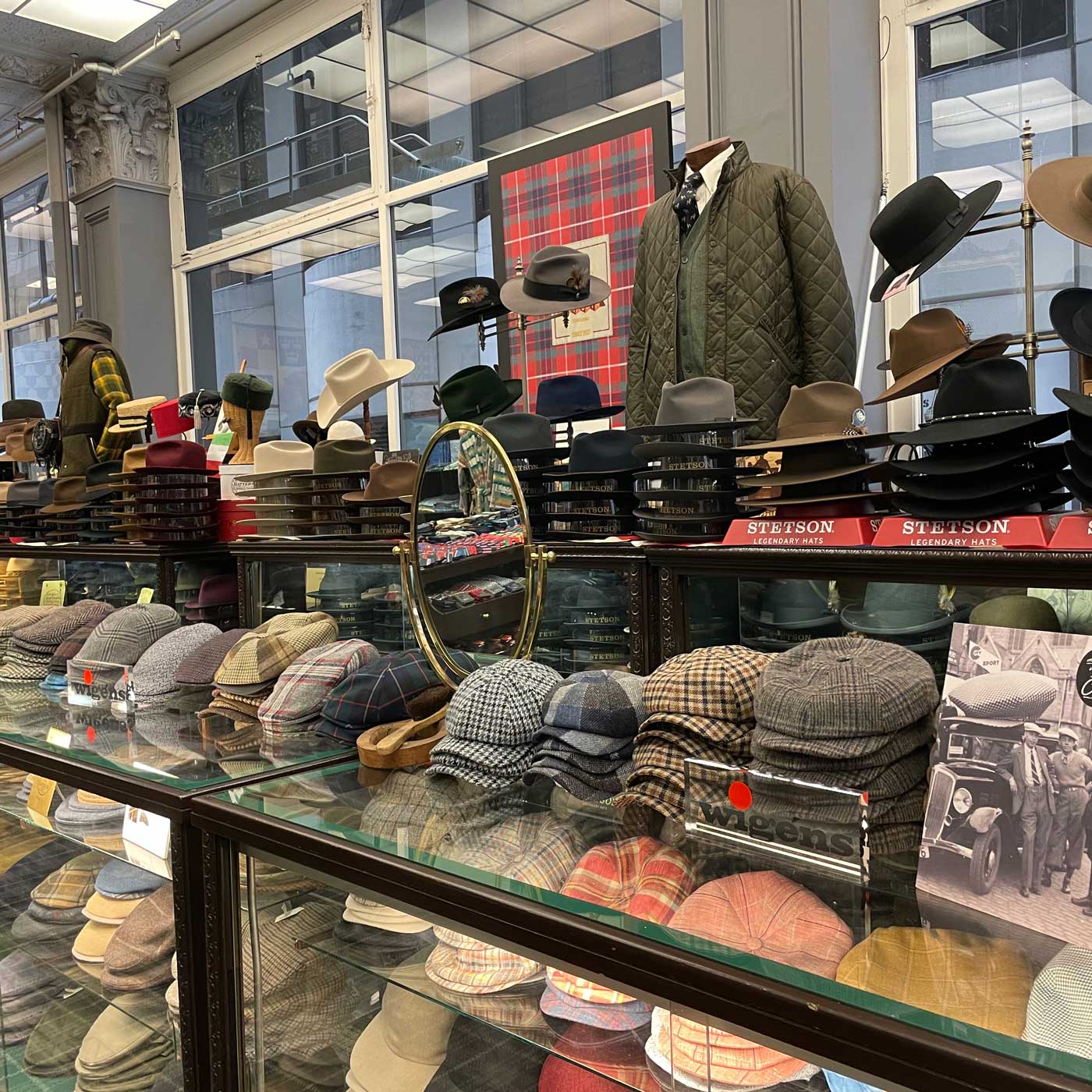 Hat and cap counter inside Cable Car Clothiers on Sutter Street